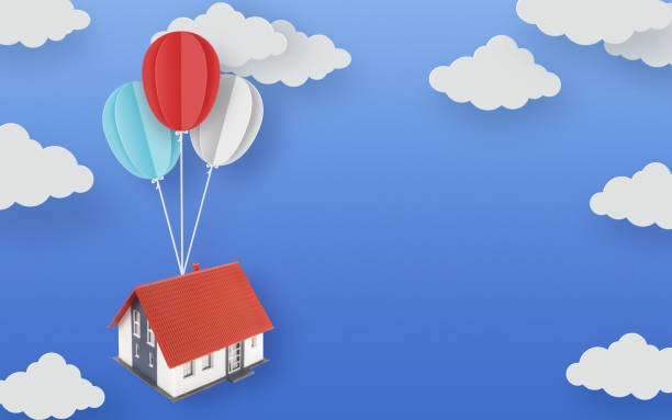 istock Balloons carrying a house 1367797981