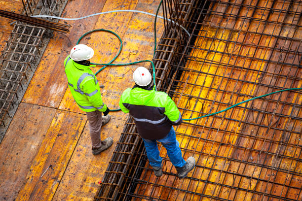 istock Surveyors at the construction site 1367799050