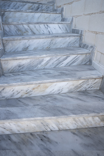 White marble stairway stairs with gray shadows in andalusia of Spain