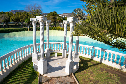 Torremolinos lake in parque de la Bateria or Battery park, public park in Costa del Sol of Malaga in Andalusia of Spain