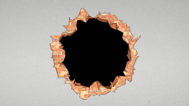 istock breach in a brick wall covered with plaster in the shape of a circle 1367802078