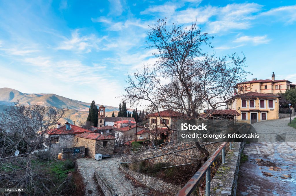 Ampelakia the historical village of Larissa regional unit. Ampelakia is the historical village of Larissa regional unit, built at the foothill of Kissavos at the entrance to the Tempi valley. Abandoned Stock Photo