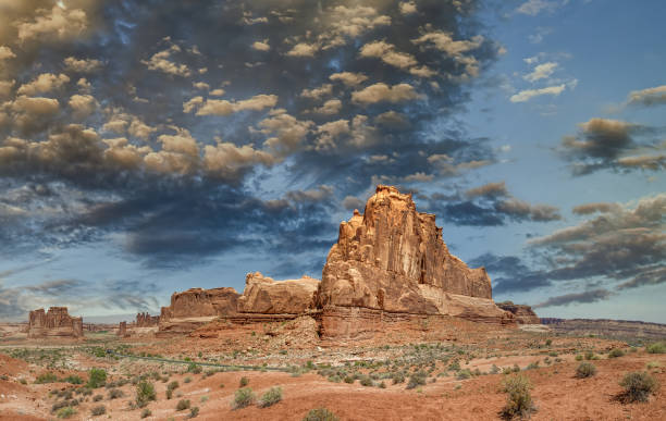 istock Rock formations at Arches National Park, Utah. Canyon panoramic view at dusk. 1367802923