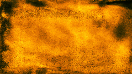 Black orange yellow dirty surface texture. Distressed background with copy space for design. Burn, burnt, danger, hell, scary, fire concept.