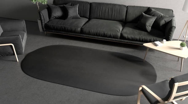 istock Blank black oval interior carpet in room mockup, side view 1367803666