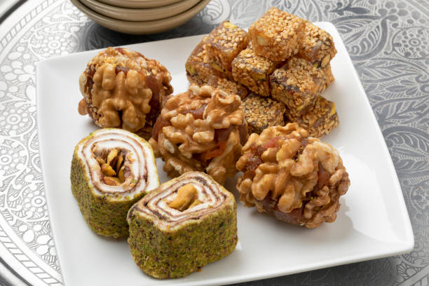 istock Plate with variation of Turkish delight with nuts close up 1367804453