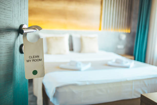 istock Opened door of hotel room. 1367804704