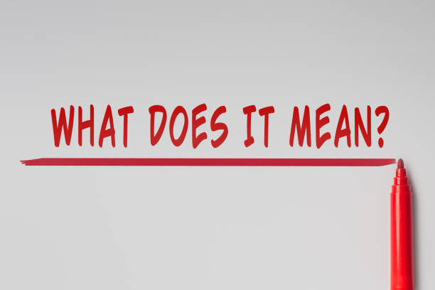 The text - What does it mean, written with red marker over red line on gray background. Concept