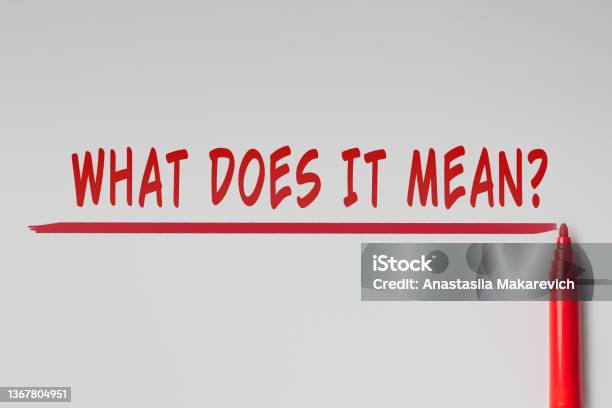 The Text What Does It Mean Written With Red Marker Over Red Line On Gray Background Concept Stock Photo - Download Image Now