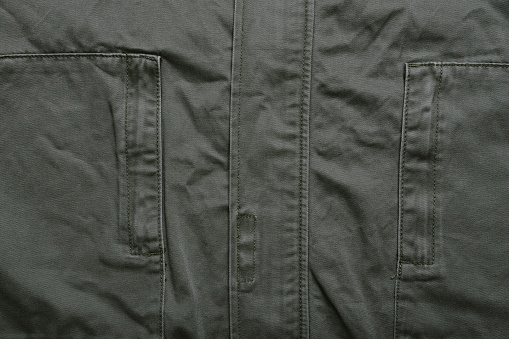 Military jacket, Detail of khaki green hood coat, Army fashion style.