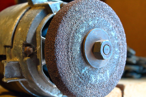 Sharpening machine. Old machine for sharpening cutting tools. Close-up. Background.