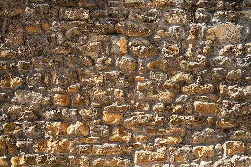 Ainsa village old town stonewall masonry stone wall texture in Huesca of Aragon Spain in Sobrarbe region