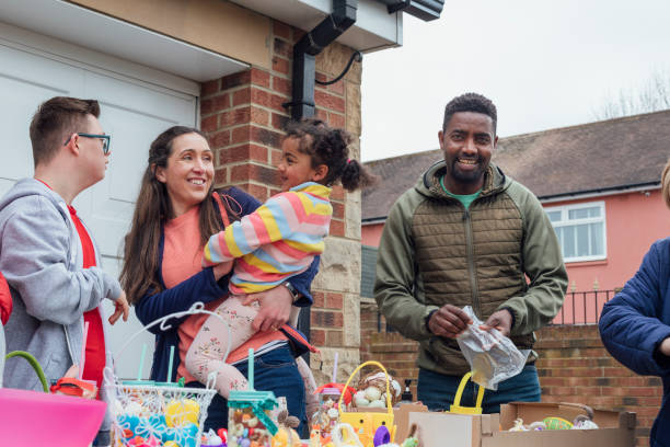 istock Working Together at a Yard Sale 1367806254