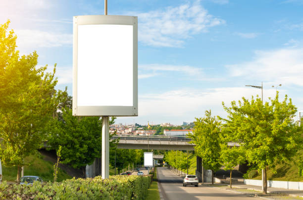 istock empty billboard in the city - mock up for advertising 1367806365
