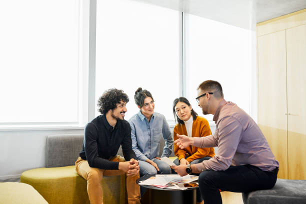 istock Business professionals discussing in office 1367806615