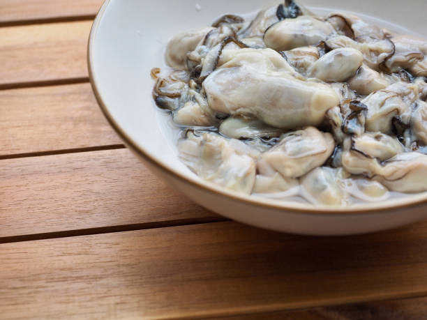 istock Fresh seafood oysters, food, cooking ingredients 1367810087