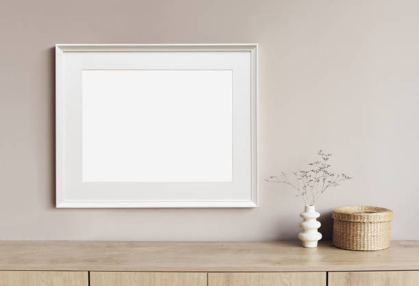 istock Artwork mock-up in interior design. Blank white horizontal picture frame on a wall 1367810516