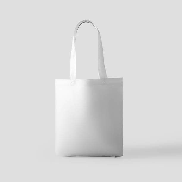 istock Mockup of stylish white totebag 3d rendering, texture bagging for design presentation, print, pattern. 1367810654