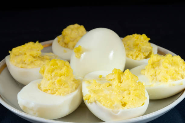 istock Stuffed egg yolk with mayonnaise in a white plate 1367811887
