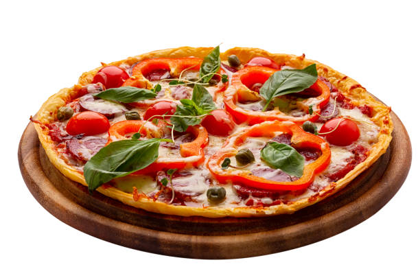 istock Delicious pizza served on wooden plate isolated on white 1367814510