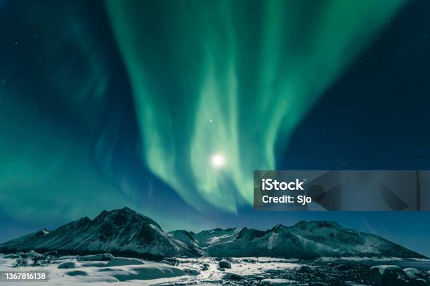Aurora Northern Polar Light In Night Sky Over Northern Norway Stock Photo - Download Image Now