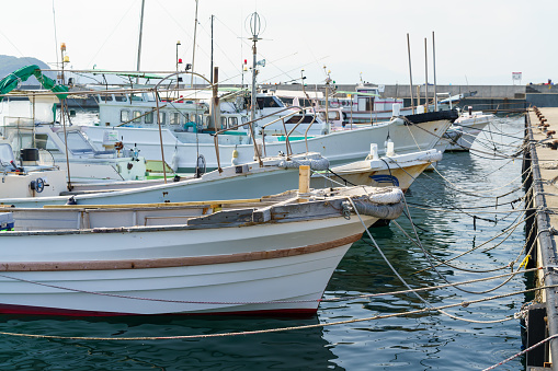 Traditional fishing boats in Japanese harbor