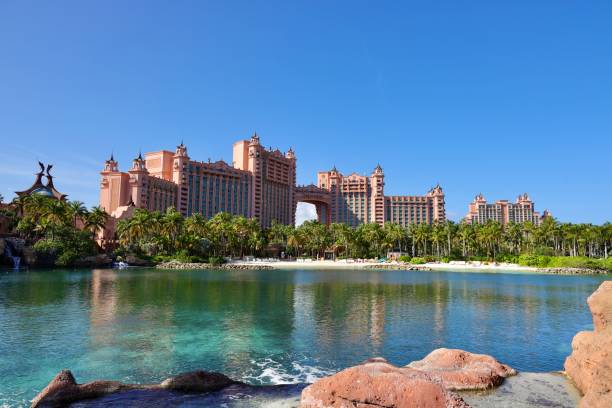 The scenic view of Atlantis hotel in Paradise Island Nassau, Bahamas- December 17,2021: The scenic view of Atlantis hotel in Paradise Island, Nassau, Bahamas. atlantis bahamas stock pictures, royalty-free photos & images