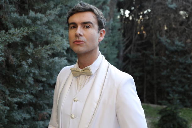 stylish man dressed all in white clothing - high society men tuxedo party imagens e fotografias de stock