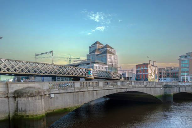 Butt Bridge - a road bridge spanning the River Liffey in Dublin, view from north west side, City in sunlight, streets photography, Dublin, Ireland