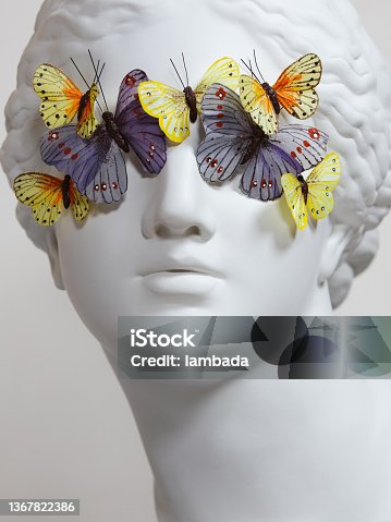 istock Greek Goddess with butterflies 1367822386
