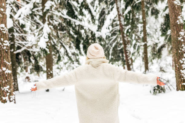 istock A girl in the winter forest 1367823408