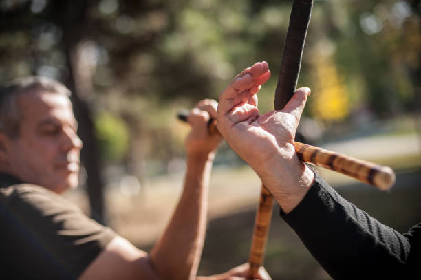 3,000+ Stick Fighting Stock Photos, Pictures & Royalty-Free Images
