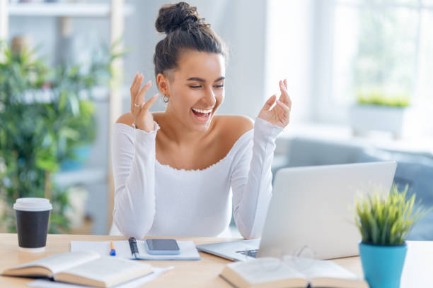 istock woman working on laptop at home. 1367825334