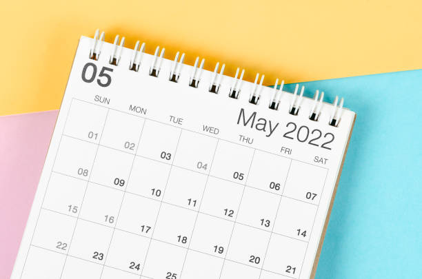 istock May 2022 desk calendar on multicolored background. 1367825416