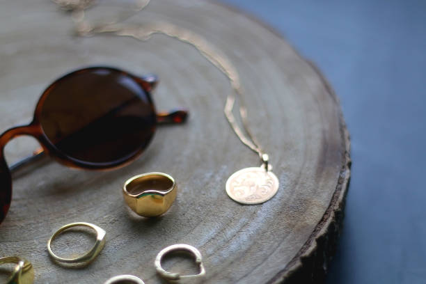 istock Sunglasses and Gold Jewelry 1367826452