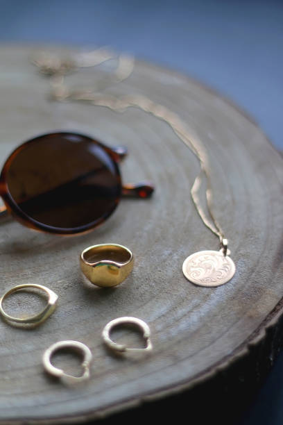 istock Sunglasses and Gold Jewelry 1367826459