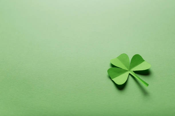 istock St. patrick's day. green background with clover leave shamrock. copy space. Paper craft 1367828021