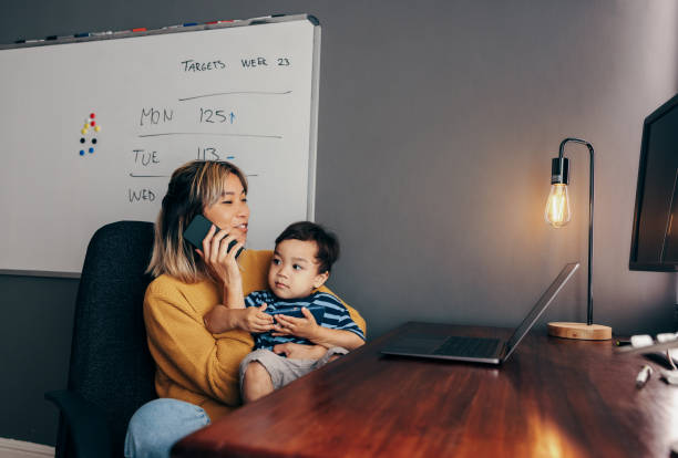 istock Mother of one working in her home office 1367833634
