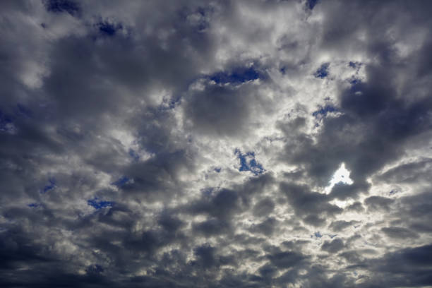 istock Wide angle of stormy grey clouds 1367833753