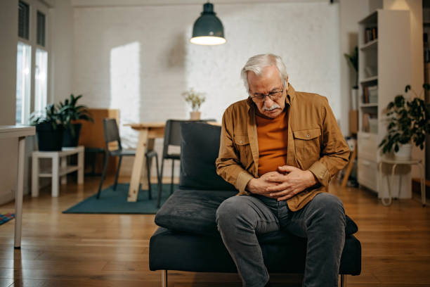 istock Senior man has stomachache 1367833958