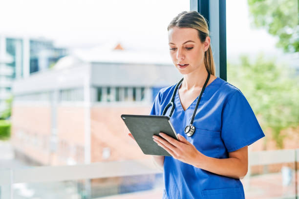 istock Shot of a young female doctor using a digital tablet at work 1367834801