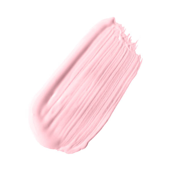 istock Stroke of pink color correcting concealer isolated on white 1367838471
