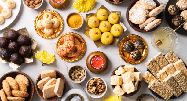 istock traditional indian sweets on concrete background flat lay 1367839181