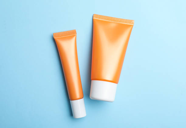istock Set of luxury cosmetic products on light blue background, flat lay 1367840042