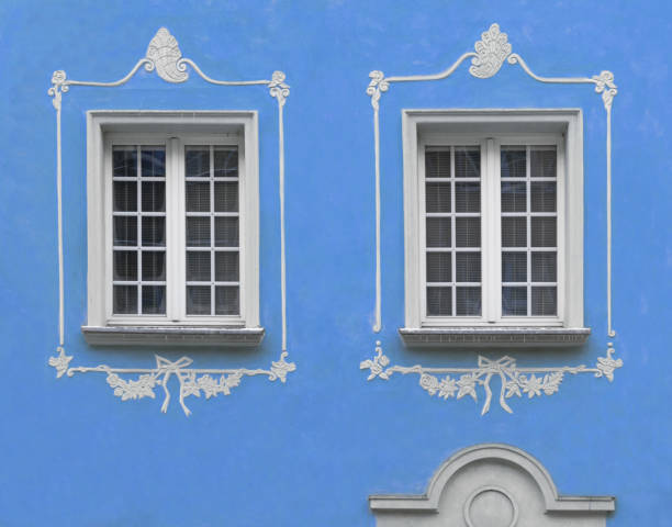 istock Beautiful white window and blue plastered wall 1367841172