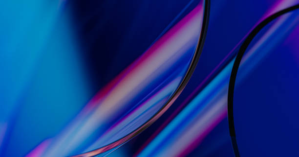 istock Glass curves refracting light - artistic business background - 3d render 1367841502