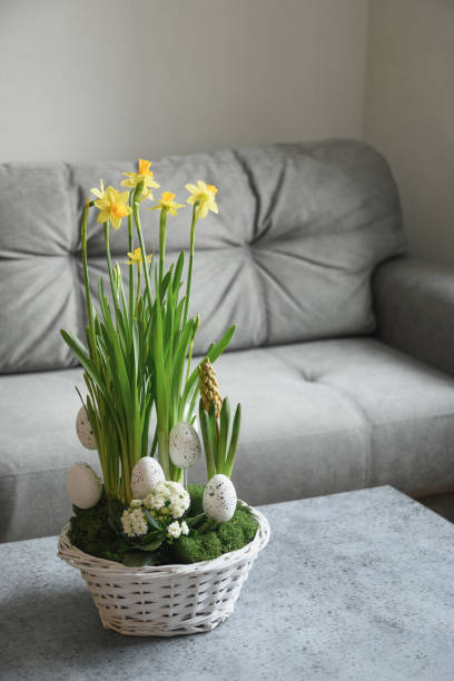 istock Easter handmade flower composition with blossom narcissus. 1367841559