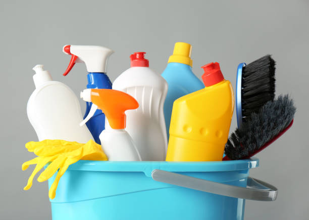 istock Bucket with cleaning products and tools on grey background, closeup 1367841567