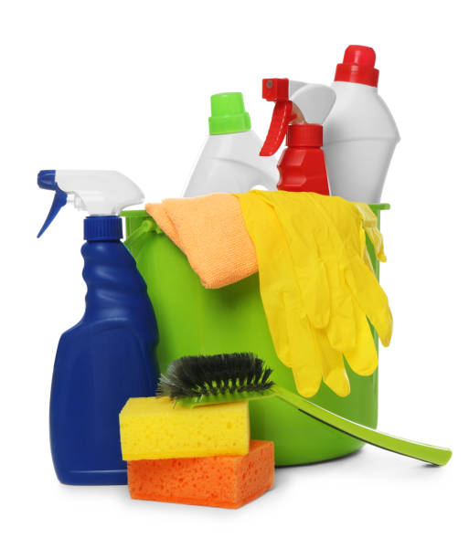 istock Bucket with different cleaning products and tools on white background 1367842424