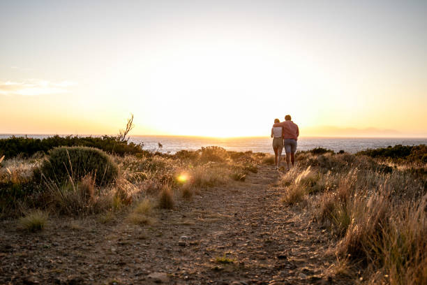 istock Young couple walking in nature. 1367842438